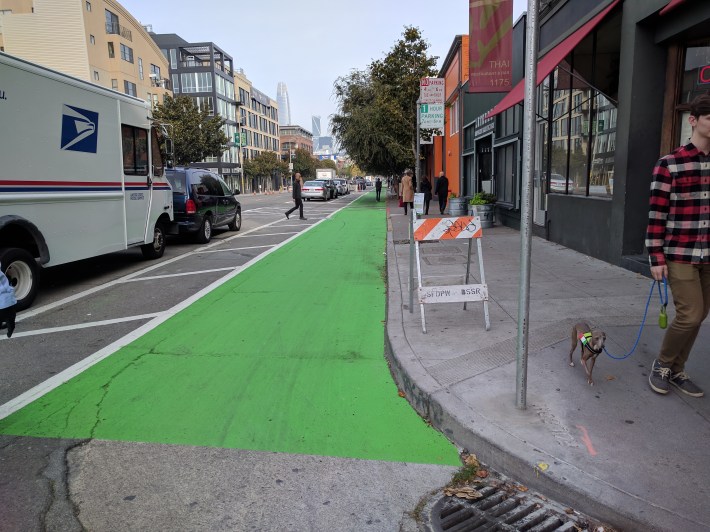 A parking protected bike lane on Folsom. While these have popped up all over SoMa, North Beach has gotten zip. Photo: Streetsblog/Rudick