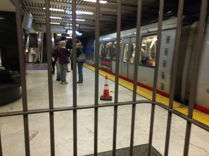 How often have you climbed up from the BART platform and missed your Muni transfer because of the awkward connection? Photo: Streetsblog/Rudick