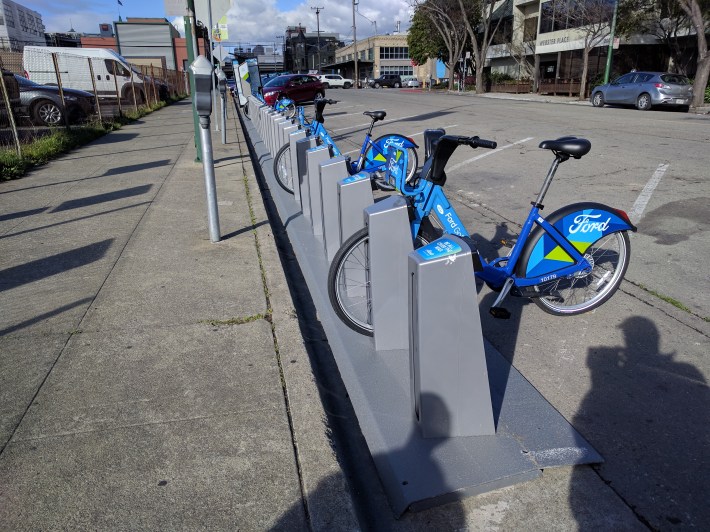 The Webster Street station, by Bicycle Coffee, was still awaiting its full complement of bike.