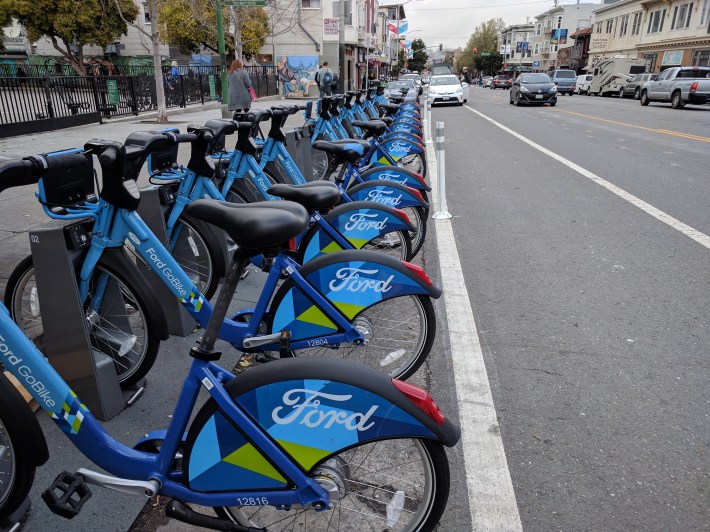 It's mysterious why SFMTA didn't put extra bollards at the bike share station.