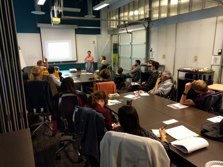 SFMTA's Liz Brisson getting the Transit Riders up to speed on planned Geary 38 improvements at last night's meeting. Photo: Streetsblog/RudickBlah