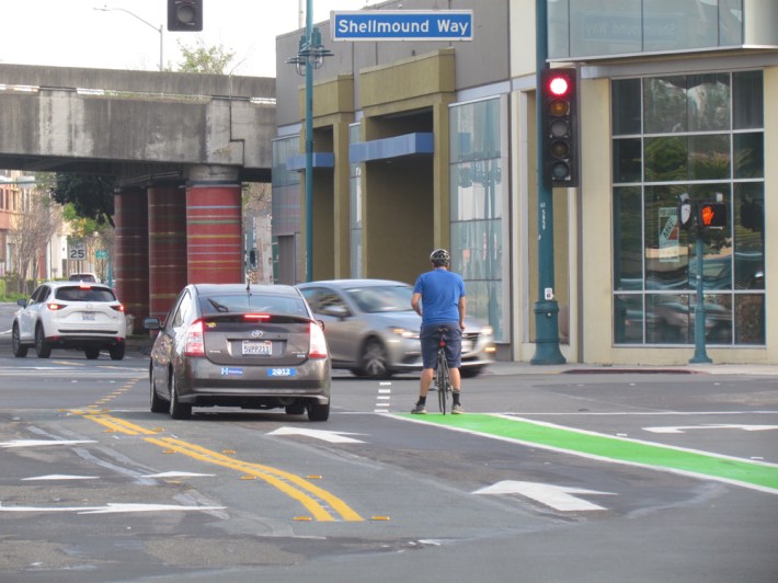 The green paint makes it super clear, finally, that bikes have a place to wait at the light to the left of right-turning cars.