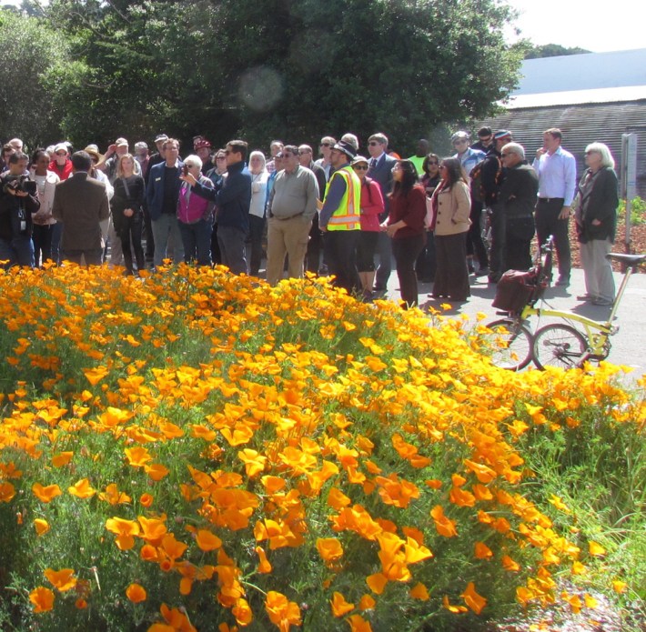 A crowd gathered first on the El Cerrito side of the gap to listen to a few speeches.