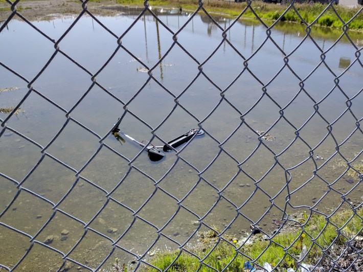 A drowned scooter near the West Oakland BART station. Photo: Streetsblog/Rudick