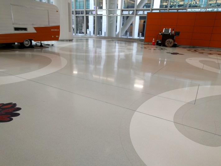The area of the floor in the grand hall where the breakout box is located for the escalators