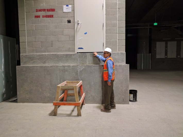 This access door is built to be flush with the future high-level train platform that will go here