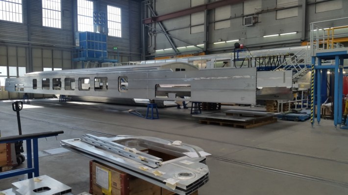 The top half of one of Caltrains new train cars, at the factory in Utah. Photo: Stadler US