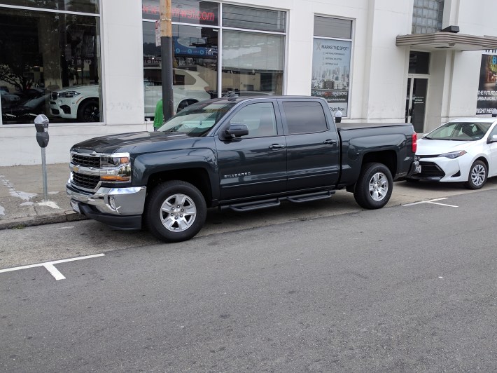 Guiterrez said this black truck (or at least one that looks just like it), which is parked on this street nearly every day, was parked next to the crosswalk and obstructed the view