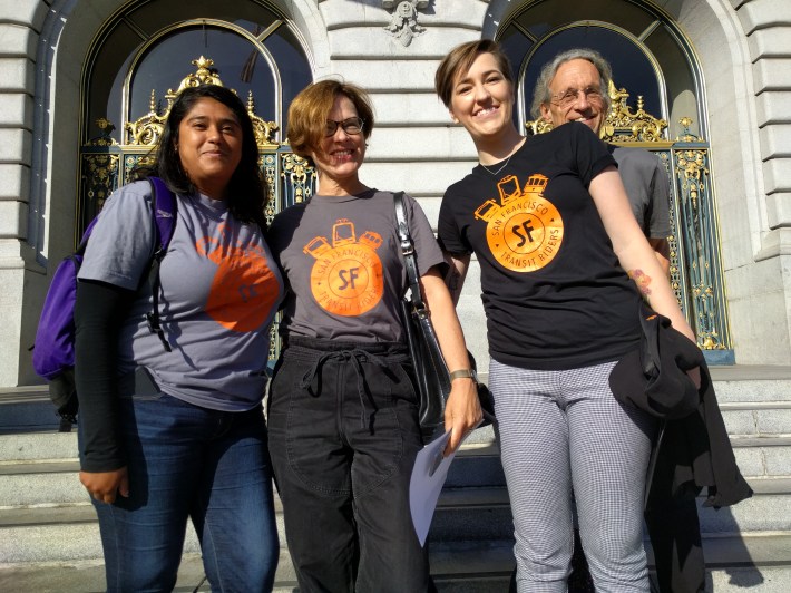 The SF Transit Riders' Genesis Garcia, Thea Selby, Rachel Hyden and Peter Straus