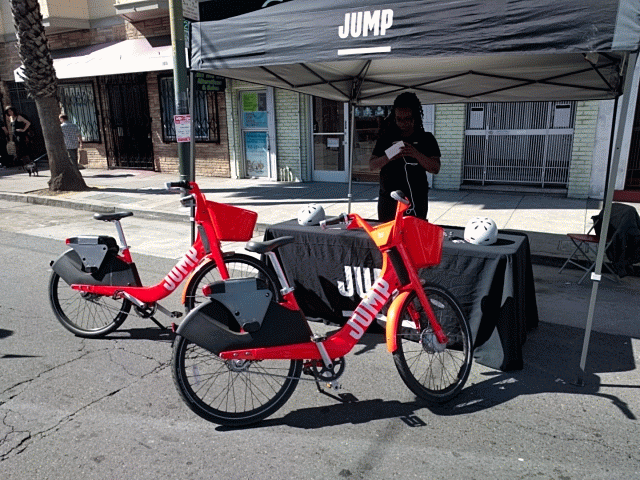 Meaghan Mitchell was recruiting customers for JUMPs e-bikes at Sunday Streets in the Excelsior