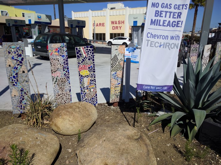 Mosaic art (a permanent installation) set up by the Youth Art Exchange by the gas station at the corner of Persia and Mission