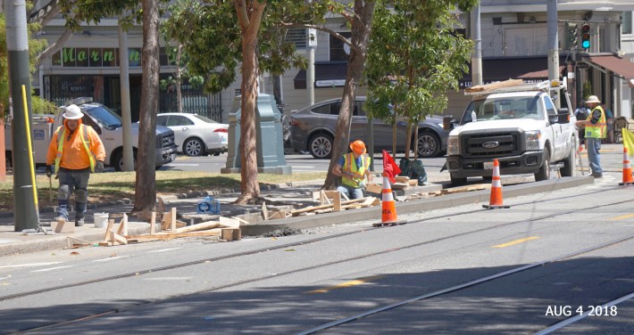 DPW crews installing the concrete curb in August. Photo: John Entwistle