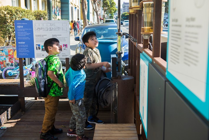 Kids learning about the water cycle at the parklet. Photo courtesy of the Exploratorium
