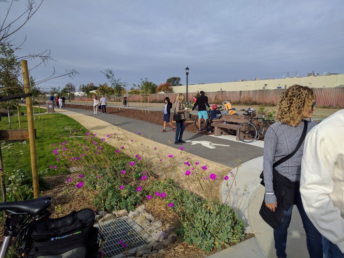 A walking path stretches the length of the park