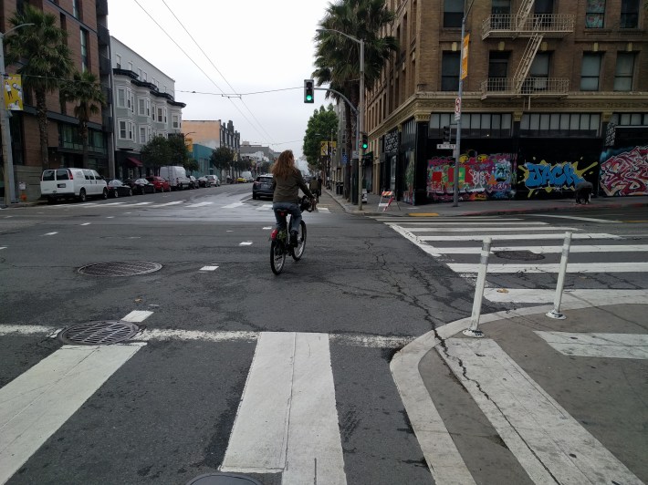 A cyclist entering Howard's new protected bike