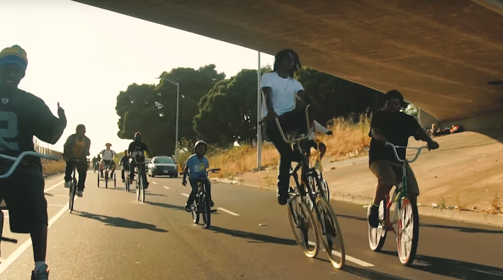 The Scrapers out for a ride. Image: Still from a Scraper Bike video