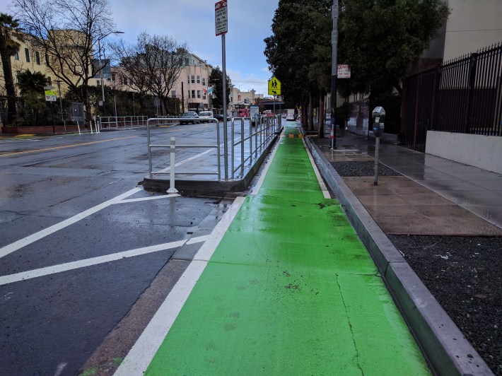 The new Valencia protected bike lane pilot where it passes San Francisco Friends School and Millennium School (across from each other at Brosnan). All pics Streetsblog/Rudick