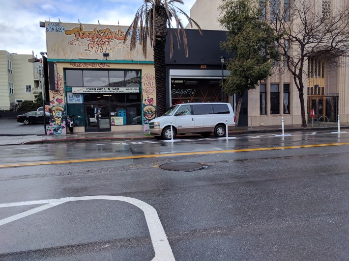 The driver of this white van drove down the newly protected bike lane heading southbound on Valencia