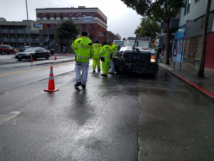 This crew was getting ready to grind pavement to finish the segment where Valencia meets Market