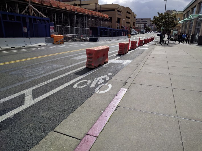 The temporary bike lane on Clay Street between 12th and 11th. That's a physical barrier--cheap, easy to install
