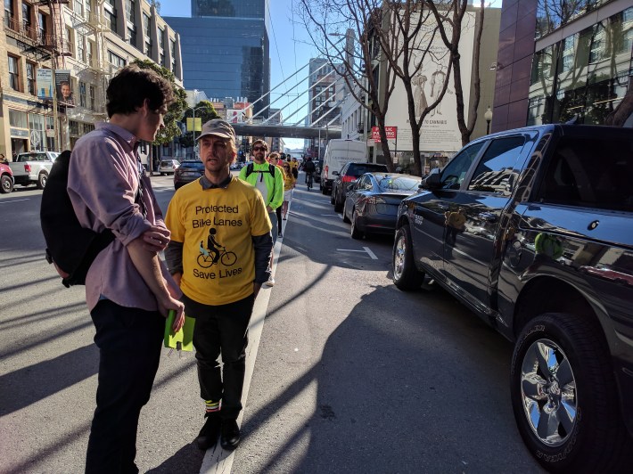 SFBC organizer Charles Deffarges and Anthony Ryan stand on the line Friday