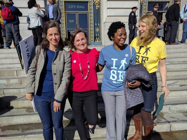 Walk SF volunteer Serena Unger, ED Jodie Medeiros, intern Candace Brady, and Marta Lindsey just after the Walk to Work rally at City Hall. Photo: Streetsblog/Rudick