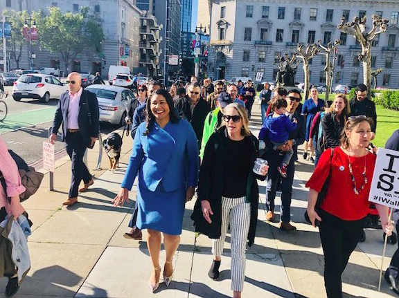 Mayor Breed and Supervisor Vallie Brown on Walk to Work Day last year. Photo: Walk SF's twitter feed
