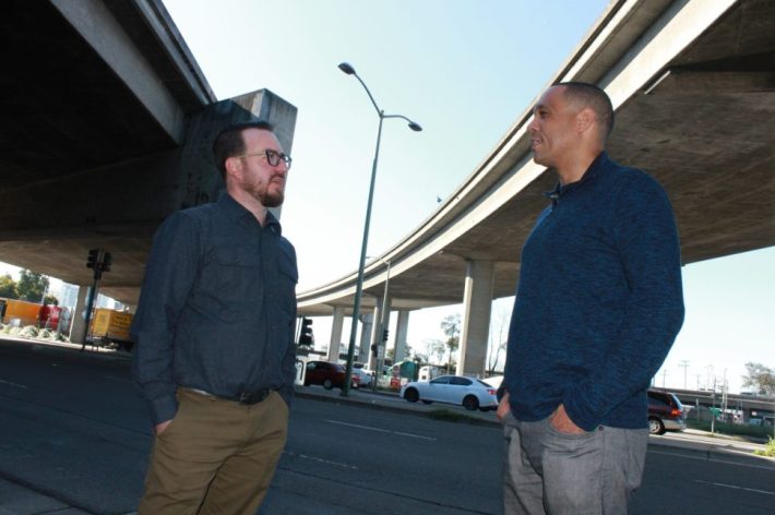 Chris Sensenig and Jonathan Fearn of ConnectOakland beneath I-980 where it connects to I-880. Photo by Nathanael Johnson