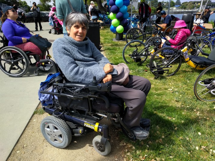 Bonnie Lewkowic in her electric wheel chair can now participate in Oakland's bikeshare program through its new adaptive bike pilot