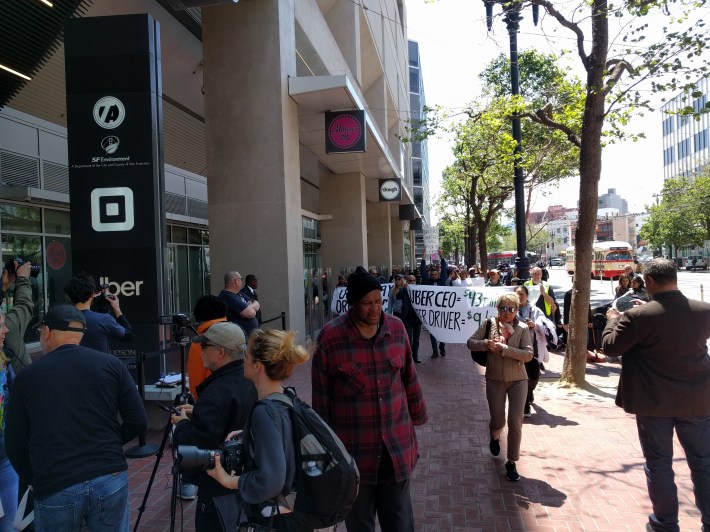 Some 100 demonstrators in front of Uber's headquarters in San Francisco this afternoon, around 2