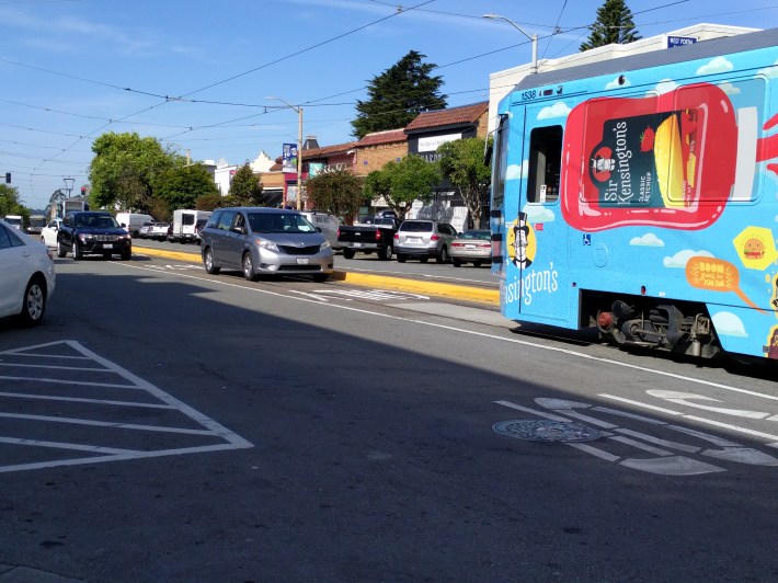 Motorists continued to use the transit-only pilot lane in West Portal with total impunity (at least they're not blocking the train in this instance, but they were in others)