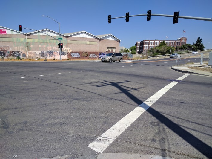 It's difficult to show from pictures alone, but Caltrans has made it impossible to walk across 23rd Avenue at 11th street