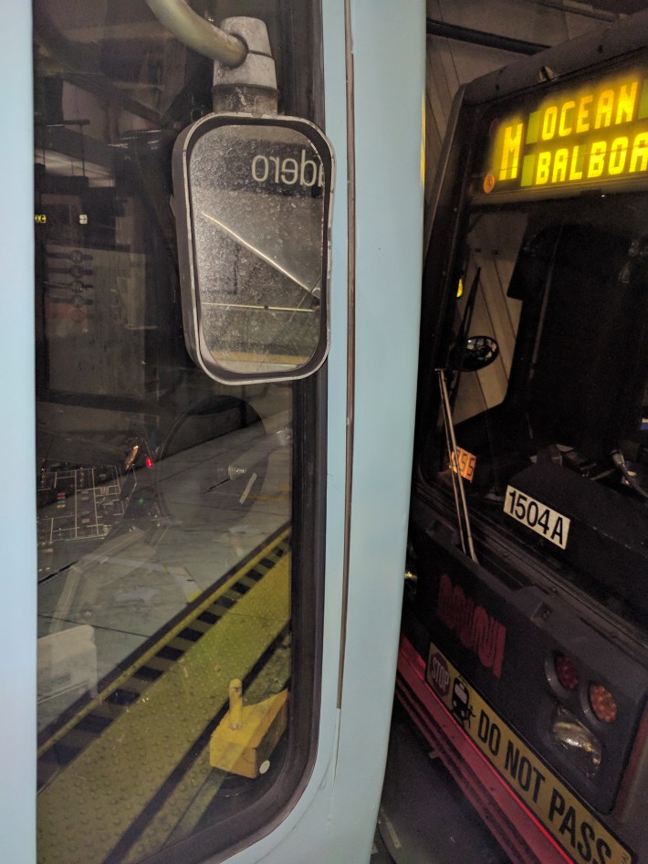Muni's older trains have conventional rear-view mirrors. Operators say these are much better than the digital screens on the new trains, which are counter intuitive and buggy