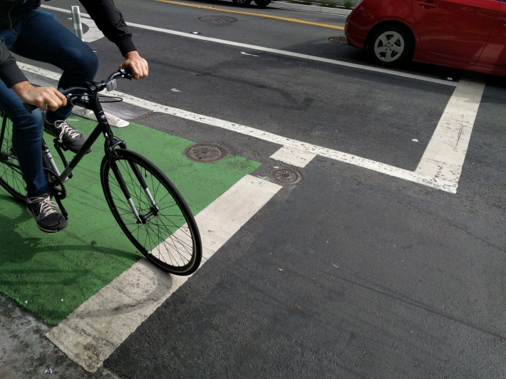 Why are the stop lines for bikes behind the stop line for motorists?