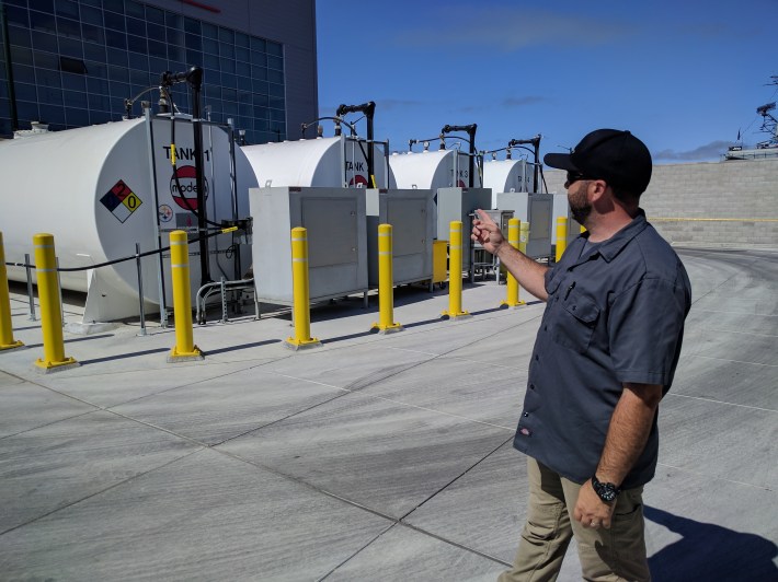 Hernandez showing the fuel tanks for the boats