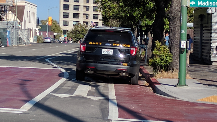 BART police also leave their cars in the new protected bike lane intersection treatments are Lake Merritt BART.