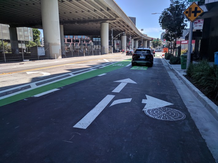 A mixing zone on 7th. Right turning motorists and cyclists are supposed to zipper across each other's paths. It's not safe.