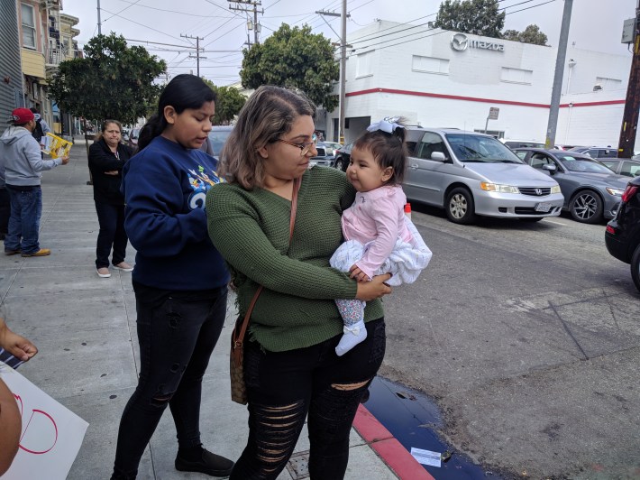 Veronica Rodriguez with one of her small children. She afraid for their safety thanks to Audi using her street as a test track