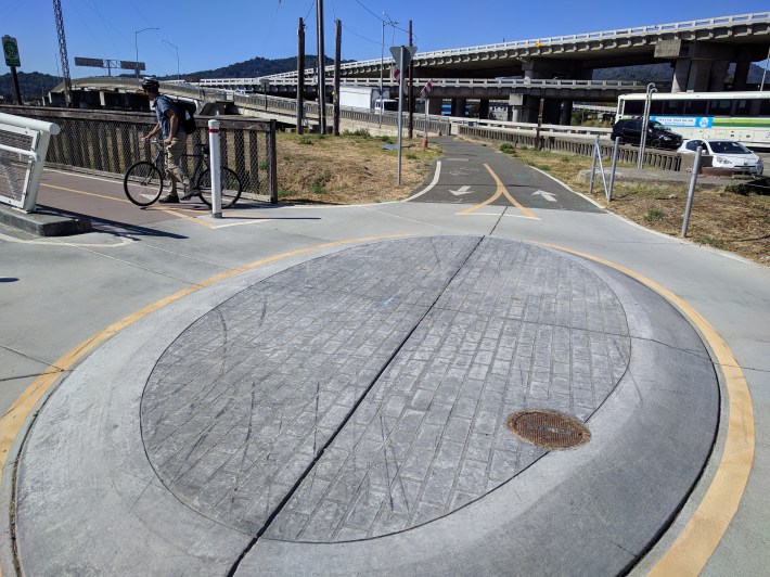 A little roundabout helps guide cyclists coming off the bridge towards the ferry terminal, downtown Larkspur, and other destinations