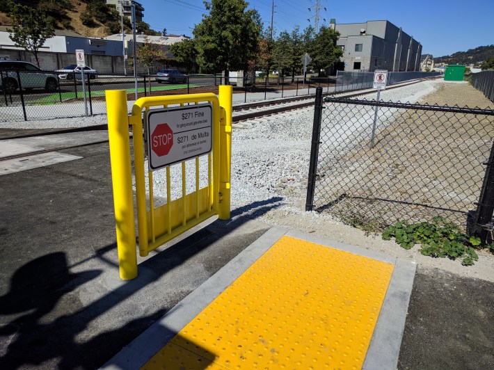 Pedestrian safety gates at the crossing at Andersen