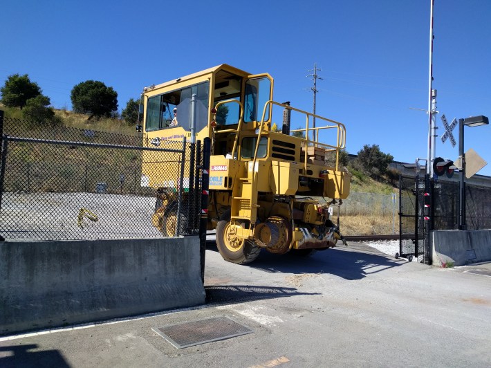 Track construction equipment moving off the ROW just north of Larkspur
