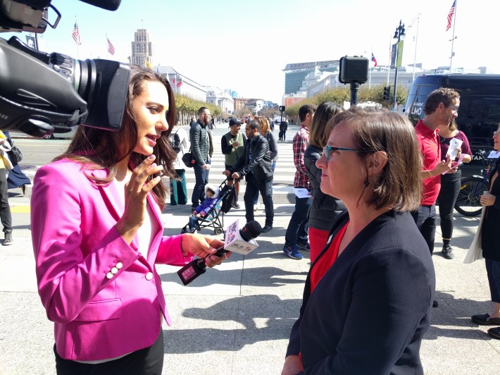 Walk San Francisco's Jodie Medeiros doing a TV interview before the vote. Photo: Streetsblog/Rudick