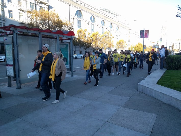 The participants toured the Tenderloin after the event on the steps of city hall