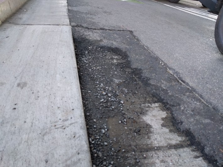 As one turns the corner, this is the pavement condition. Photo: Streetsblog/Rudick