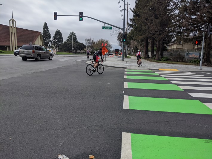 Cyclists, confused by the new infra, took a moment to adjust and switch from street riding to the protected bike lane