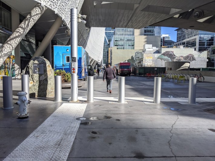 These bollards give emergency vehicles (and food trucks) access to this otherwise car-free space