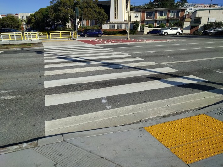 The solution allowed by the state is a multi-stage crosswalk. File photo Streetsblog/Rudick