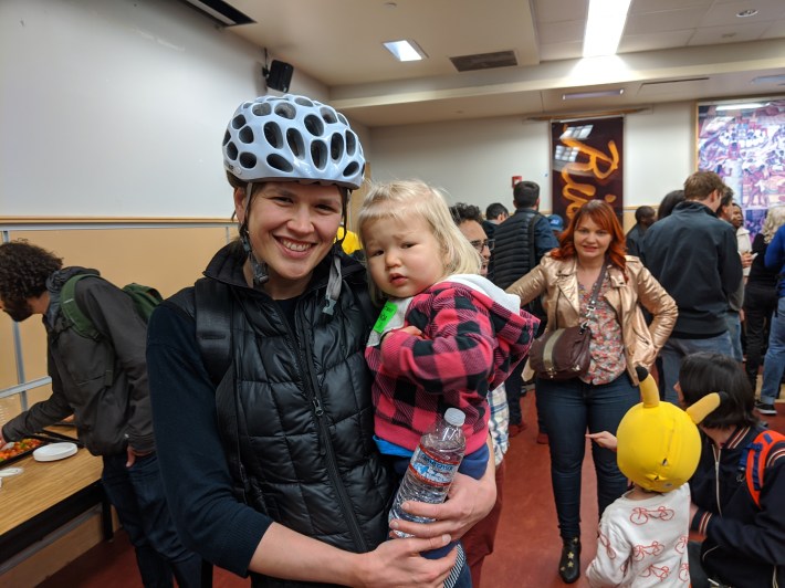 NelsonNygaard’s Terra Curtis, who bikes around town with her daughter, also came to comment on the designs. Photo: Streetsblog/Rudick