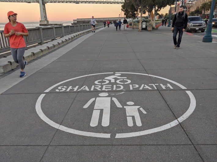 The Embarcadero promenade is already shared, so just segregate it--as Vancouver did--so it's actually usable for cyclists. Photo: Streetsblog/Rudick