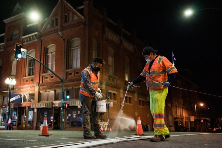Alameda workers re-striping Park Street last week. Photo: City of Alameda